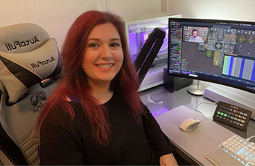 Picture of Kaydee at desk in 2022 office KaydeeCodes